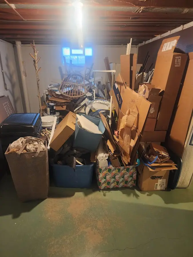 Roll-off dumpster container at job site for 4 Yard Dumpster Rental in Huntsville